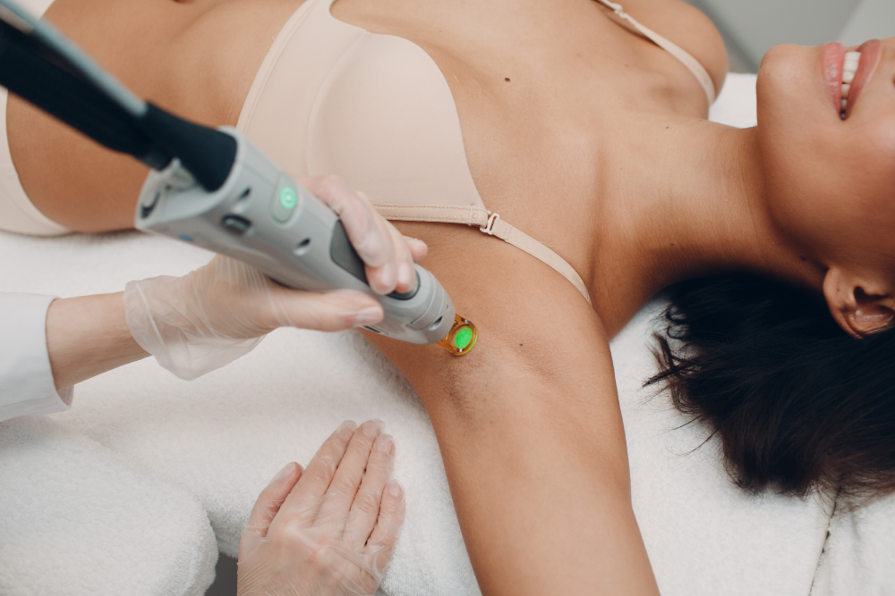 Laser hair removal on underarm in progress.