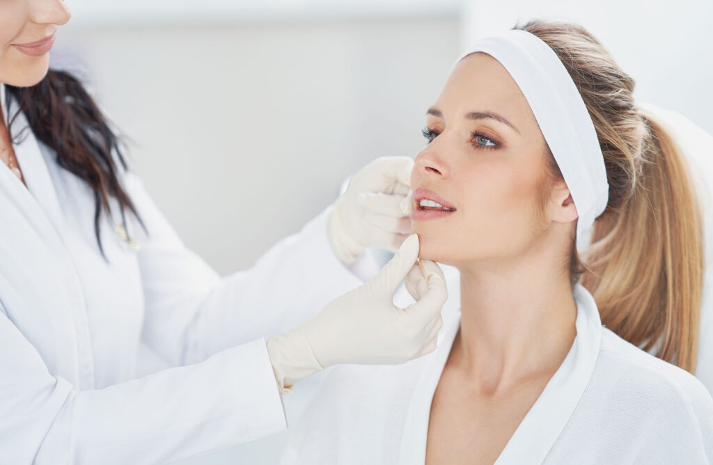 Woman at consultation for Sculptra treatment.