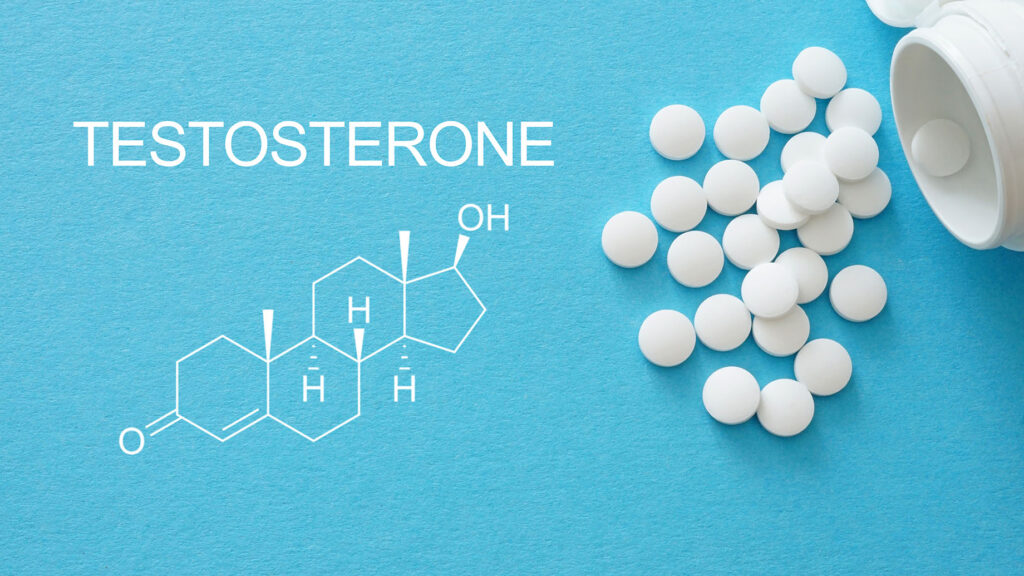 white pills spilled from a container next to a molecular structure labeled “Testosterone” on a blue background